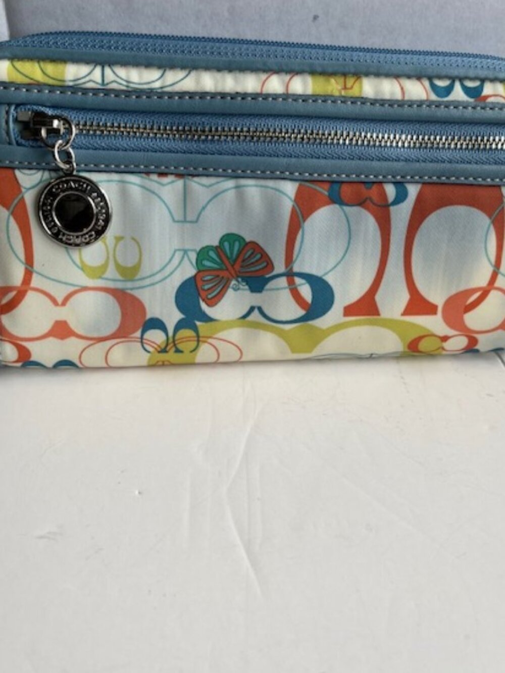 Coach multicolor signature print wallet.
